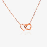 Rose gold double-heart necklace, engraved with a sample name.