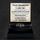 A leather-style bracelet with a black presentation box, containing a heartfelt message card, displayed on a dark background.