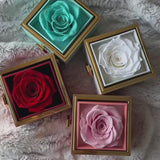 Video clip showing Senvoa preserved rose boxes with red, blue, pink, and white roses.